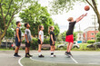 © Louis-Paul Photo - great child Team in sportswear playing basketball game