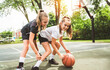 © Louis-Paul Photo - two girl child in sportswear playing basketball game