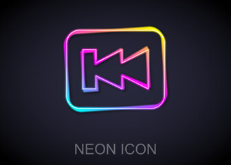 Fototapete - Glowing neon line Rewind button icon isolated on black background. Vector