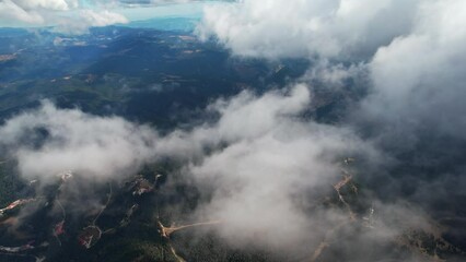 Poster - Moving white clouds blue sky smoothly scenic aerial view. Drone flies forward high in blue sky through fluffy clouds on panorama sky. Fog. Nature 