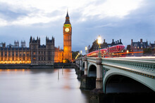 Westminster Bridge Over Thames River Against Big Ben During Sunset