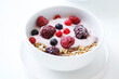 Close-up of breakfast served in bowl over white background
