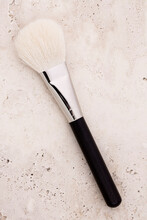 Overhead View Of Make-up Brush On Table