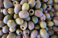 High Angle View Of Green Olives For Sale At Market
