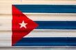 © Cavan Images - Cuban flag on iron surface