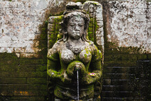 Old Statue Fountain At Temple In Bali, Indonesia