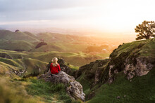 Girl Sitting On A Rock At Te Mata Peak Watching The Sunset