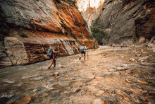 Girls in The narrows trail in Zion National Park