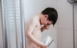 © Cavan Images - Bathing Child at home
