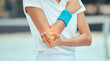 © David Lahoud/peopleimages.com - Tennis elbow, pain and injury with a sports woman holding her joint during training, workout and exercise. Fitness, health and accident with a female athlete in a game or match on a court outside