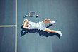 © David Lahoud/peopleimages.com - Tired tennis sports loser man on floor with racket, ball and court in summer sun from above. Relax and fitness player lying on ground, resting or taking break after match, game or outdoor practice