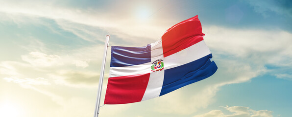 Wall Mural - Dominican Republic national flag cloth fabric waving on the sky - Image