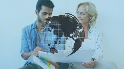 Poster - Animation of spinning globe over diverse male and female colleagues discussing at office