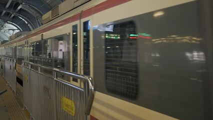 Canvas Print - airport rail link train approaching to train station