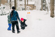 © vin - asian family playing in winter