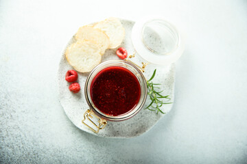 Canvas Print - Raspberry jam or sauce with fresh rosemary