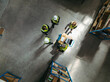 © Jacob Lund - Overheard view of a warehouse team having a discussion during a meeting