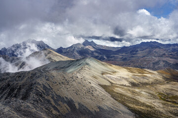 From the pan de azucar peak with an altitude of 4,680 above sea level in the national park sierra de la Culata with a view of two other peaks called pan quemado and pan de sal.