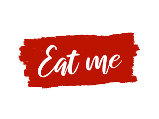 A simple handwritten red text on a brushed surface: eat me. Isolated.
