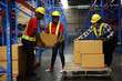  Portrait of worker in warehouse, they happy and working at The Warehouse. Storehouse area, Shipment.  warehouse worker unloading pallet goods in warehouse