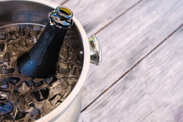 Wall Mural - Close-up of opened bottle of sparkling wine or champagne