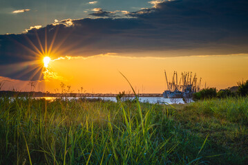 Wall Mural - Sunset with the Shrimp Boats