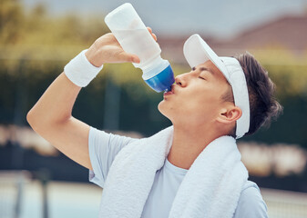 Canvas Print - Asian man drinking water, fitness and relax after a training session, workout or exercise. Athlete, health and sports male resting with refreshing liquid after playing a sport, cardio or running.