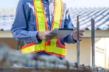 Asian Engineer construction are worker employee working by safety control helmet on site building