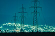 Low angle view of cascading power lines at night