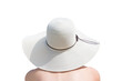 Young woman with sun hat, back view.