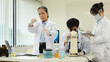 © Prathankarnpap - Professional scientist team conducting experiment in laboratory. Medicine and science research concepts