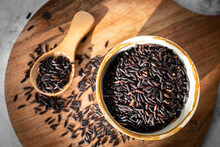 Black Rice, Also Known As Purple Rice Or Forbidden Rice. Organic Unpolished Black Rice Grains As A Source Of Complex Carbohydrates And High In Antioxidants.  