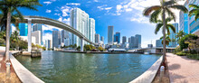 Miami Downtown Skyline And Futuristic Mover Train Above Miami River Panoramic View