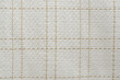 Fabric texture background with golden yarn. Gold fabric tweed texture, background. 