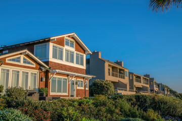 Beach side houses against clear blue sky at Del Mar Southern California.