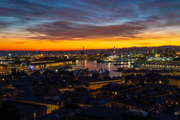 Wall Mural - GENOA, ITALY, JANUARY 28, 2022 - View of the port of Genoa at sunset, Italy.