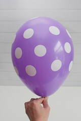 Wall Mural - purple latex balloon isolated on white background