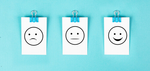Wall Mural - Head with a sad and a happy face, mental health concept, positive and negative mindset, depression, support and evaluation symbol, emotion