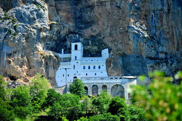 Montenegro:Ostrog Monastery is a monastery of the Serbian Orthodox Church positioned against a vertical rock face on the Ostroška Greda cliff, dedicated to Saint Basil of Ostrog