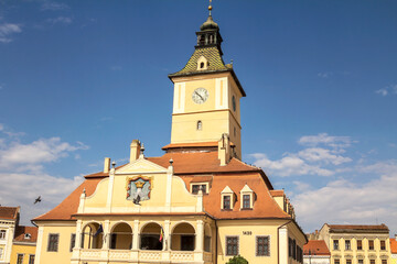 Wall Mural - Brasov, Romania, the central square of the city of Brasov, the old ranotsny square, tower with hours in the center - Aug 2022