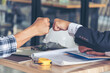 © aFotostock - Two Men team fist bump Business Partner Businessman Trust Teamwork Partnership Industry contractor dealing mission business. Mission Business team meeting group of People Fist bump Hands together