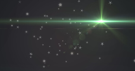 Poster - Image of glowing green light moving over stars in background