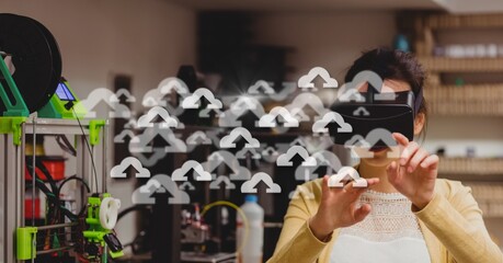 Poster - Composite image of multiple cloud icons against caucasian woman wearing vr headset