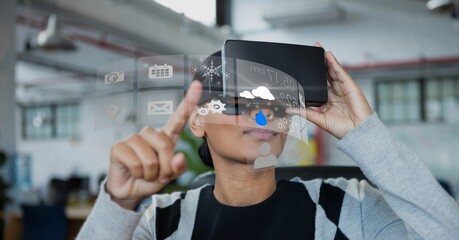 Poster - Digital interface with data processing against african american woman wearing vr headset