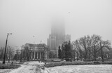 Fototapeta Londyn - Palace of Culture and Science in Warsaw on a foggy cold winter day