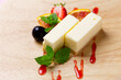 Cheese cakes with fresh strawberries, fruits on plate, Cutting board