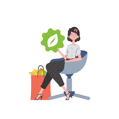 Wall Mural - A girl sits next to a bag of healthy food and redirects the EKO icon.   Trend style,  .