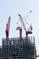 Wall Mural - View of the building construction site with cranes in Taichung, Taiwan.