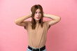 © luismolinero - Young English woman isolated on pink background frustrated and covering ears