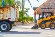 Dump Truck Excavator Remove Seagrass Seaweed Sargazo From Beach Mexico.